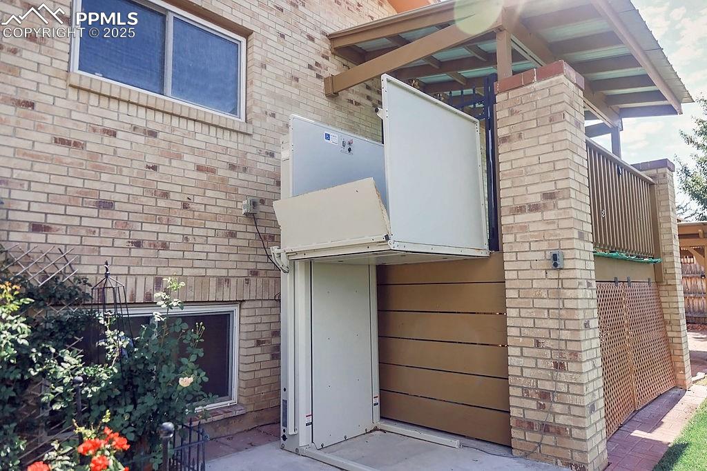 Image 26 of 50: Exterior Wheelchair Lift off Primary Bedroom