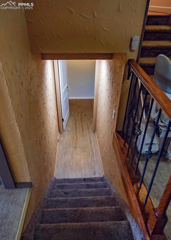 Image 29 of 50: Entry Level to Lower Level Stairs