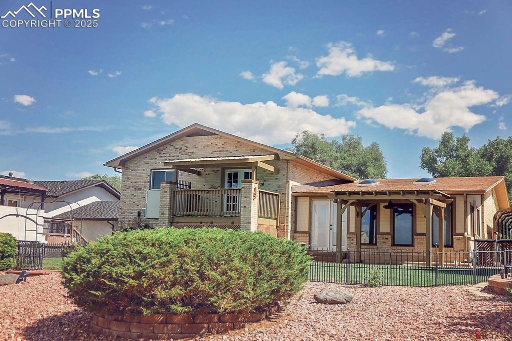 Image 41 of 50: Back Exterior & Backyard