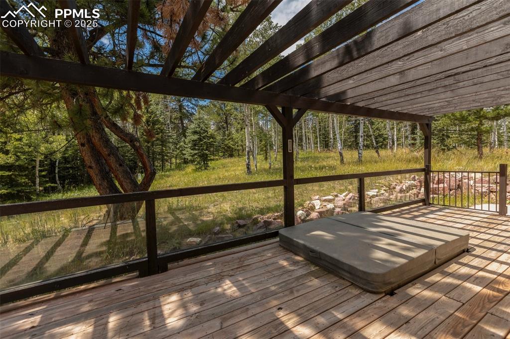 Image 41 of 50: Deck off of Master Bedroom with hot tub
