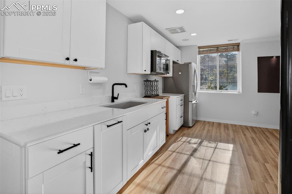 Image 29 of 43: Basement Bar