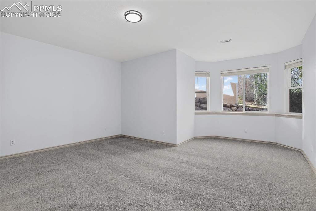 Image 35 of 43: Basement bedroom