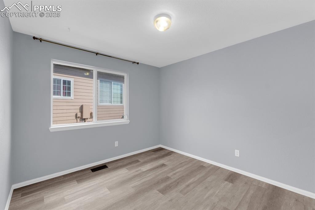 Image 15 of 36: Upper Guest Bedroom 1