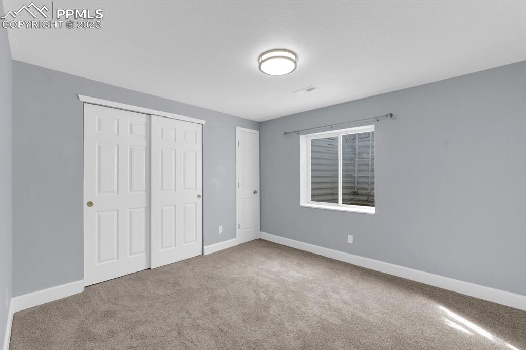 Image 20 of 36: Basement Bedroom 1