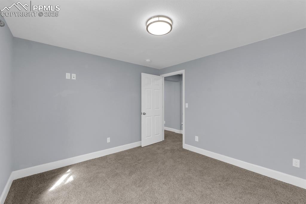 Image 21 of 36: Basement Bedroom 1
