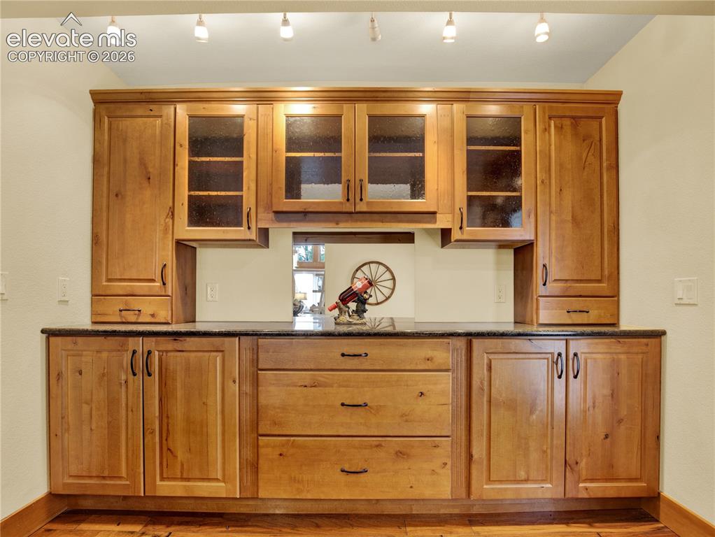 Image 17 of 43: Built in buffet in the formal dining room