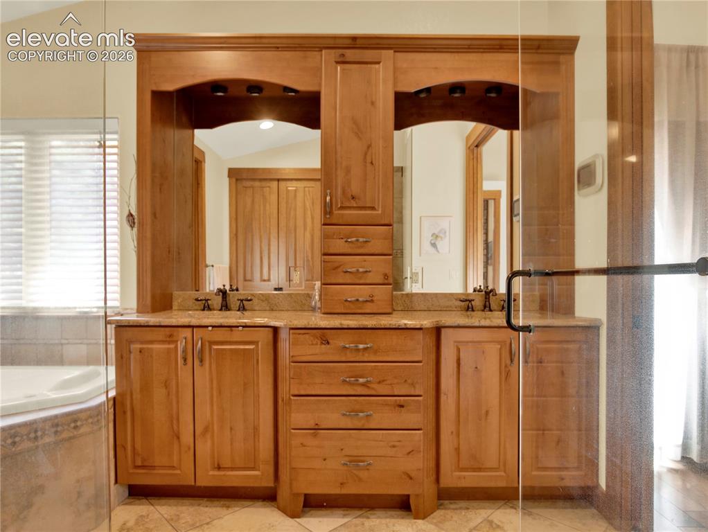 Image 21 of 43: Double vanity in the primary bathroom