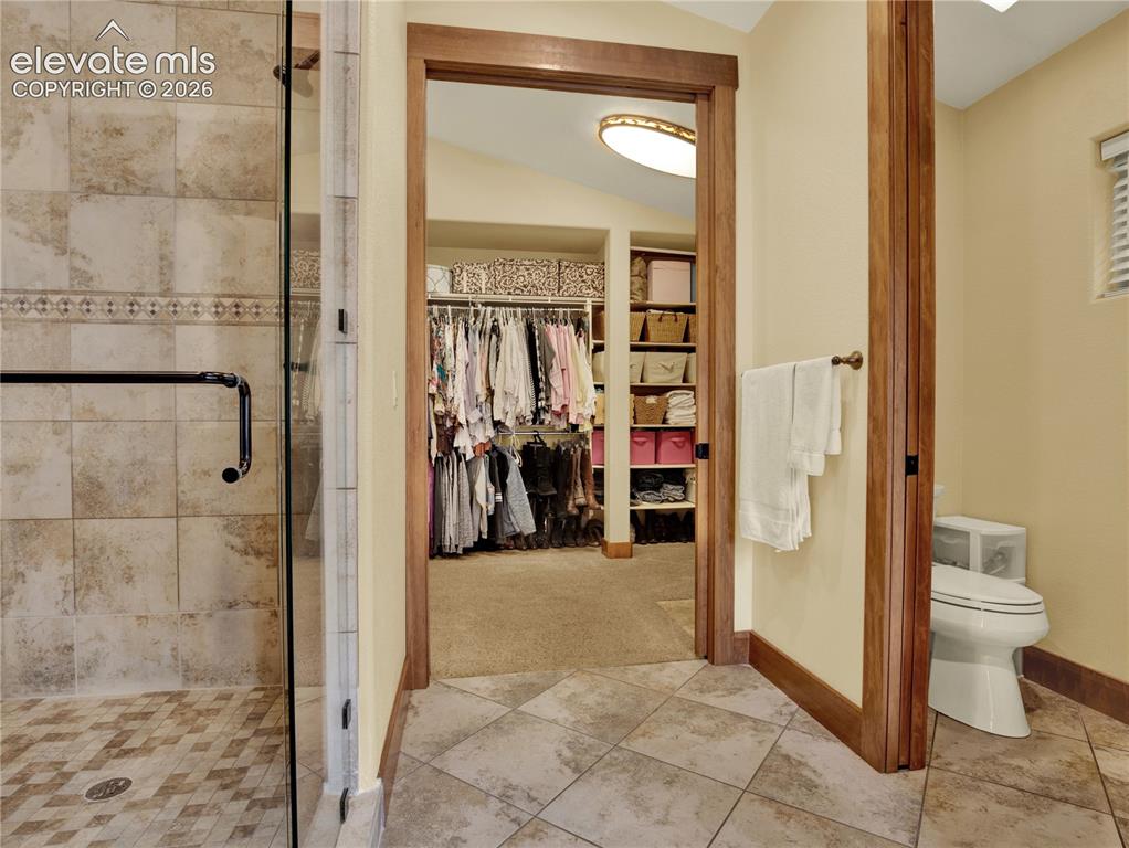 Image 23 of 43: The primary bathroom comes complete with large walk in shower and private c