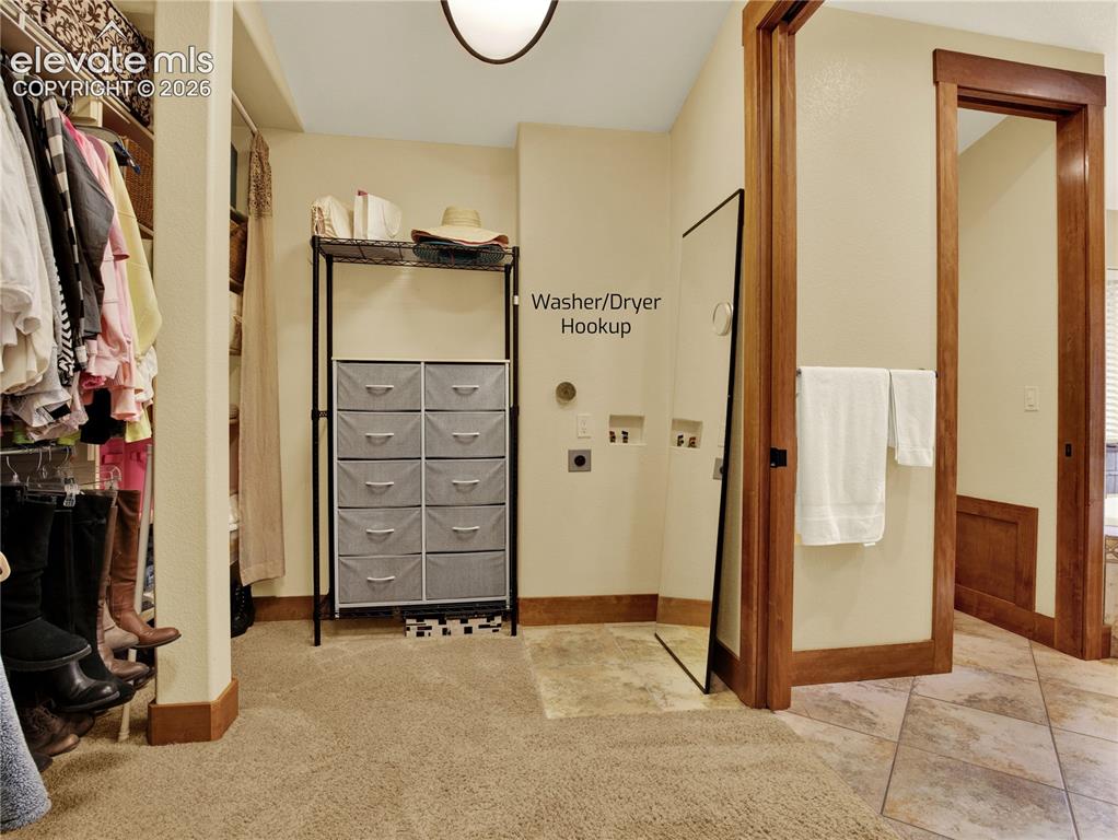 Image 24 of 43: Very Large walk in closet with wash/dryer hookups for extra convenience