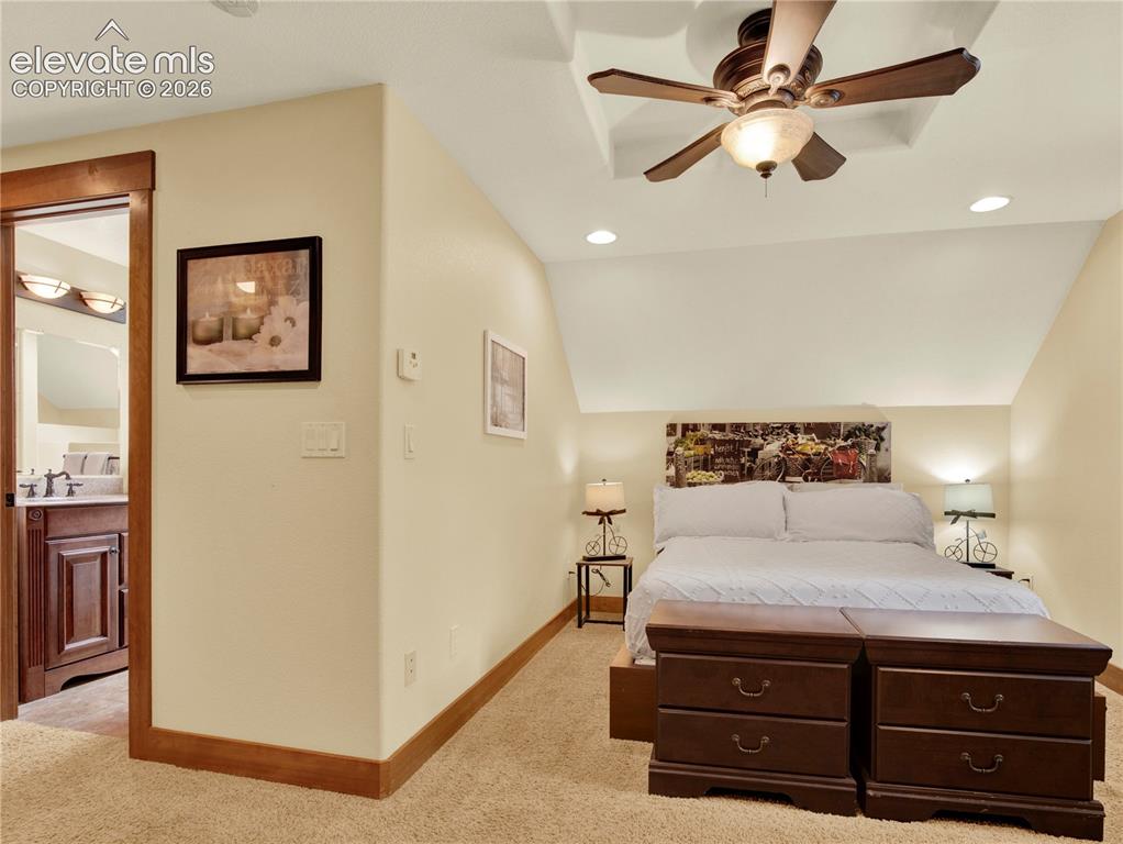 Image 26 of 43: An additional bedroom off the loft with an ensuite bathroom