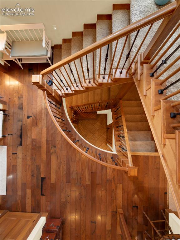 Image 30 of 43: Beautiful stair case that goes from the loft all the way to the basement