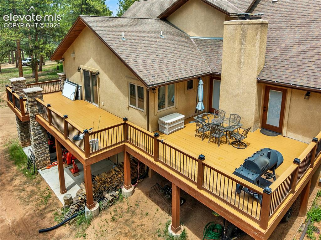 Image 38 of 43: 2 deck spaces on the south side of the home