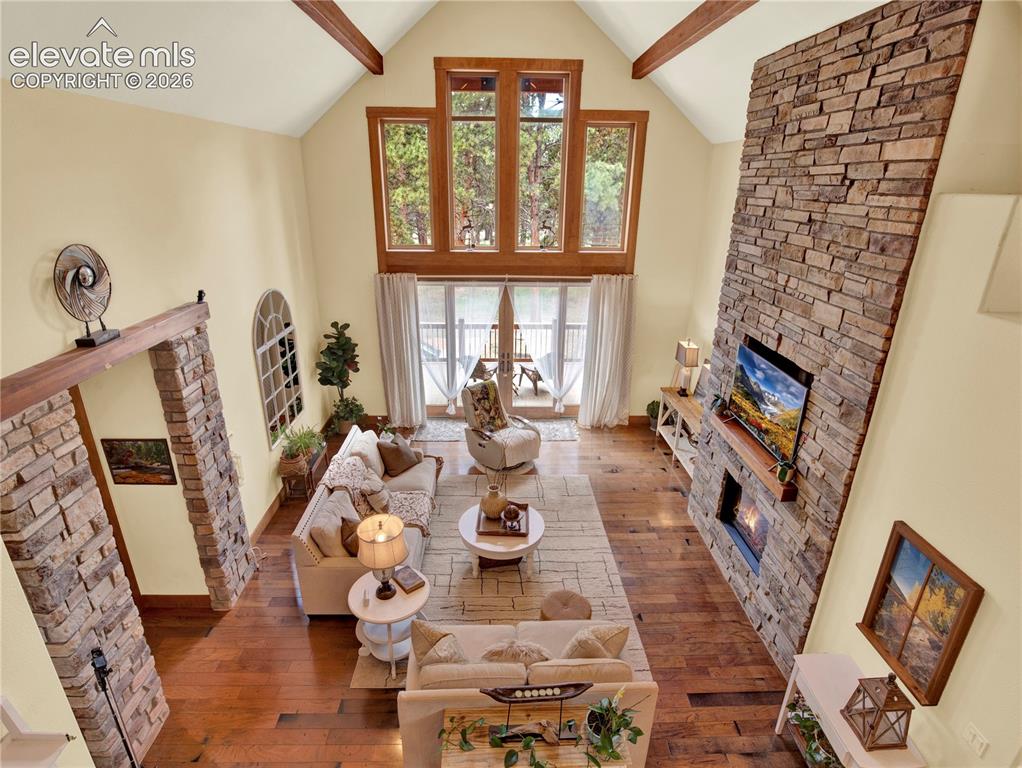 Image 7 of 43: A view from the loft over looking the living room