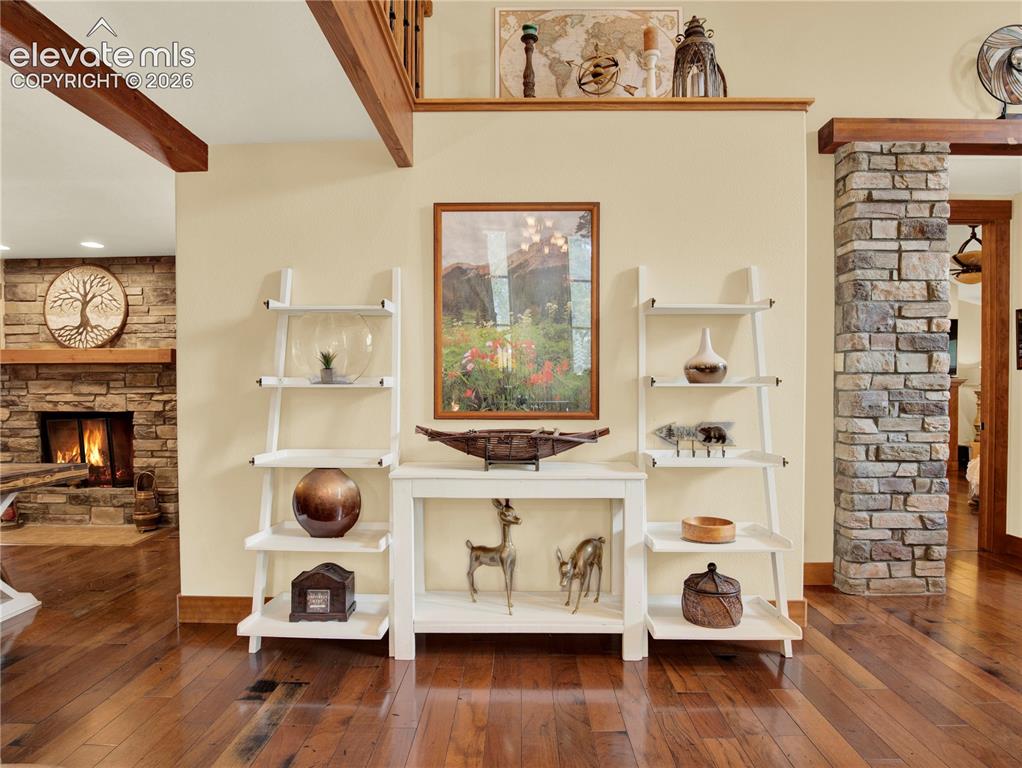 Image 9 of 43: Wall to the end of the living room that separates the formal dining room an