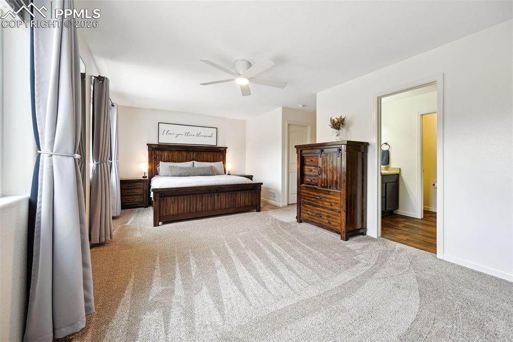 Image 15 of 33: has an adjoining bathroom