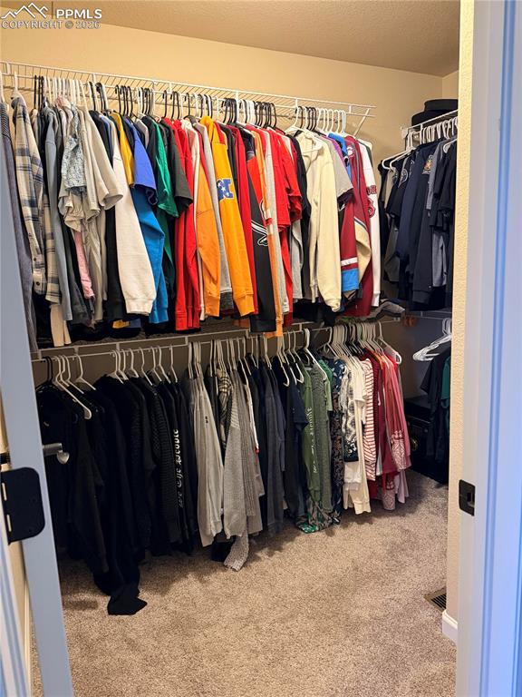 Image 19 of 33: primary bedroom large walk-in closet