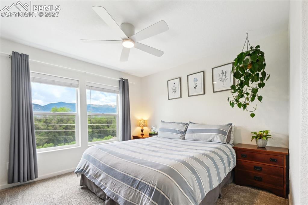 Image 23 of 33: Bedroom #2 with great mountain views 