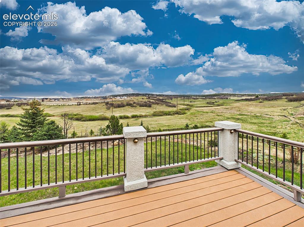 Image 41 of 50: Stunning unobstructed views overlooking open space, creating a peaceful and