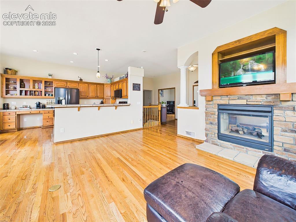 Image 8 of 50: Seamless connection between the living room and kitchen creates an ideal la