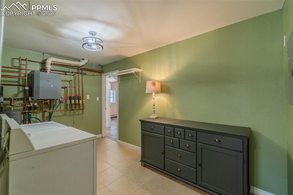 Image 38 of 50: Laundry area with Certified Broiler unit. Fully serviced and in fantastic w