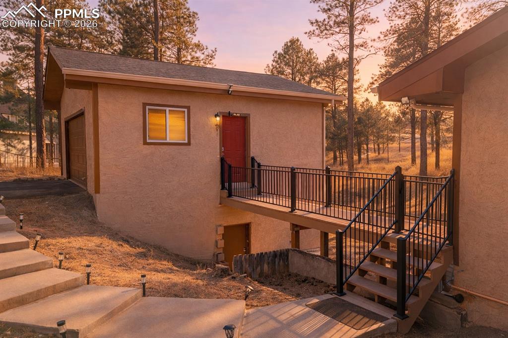 Image 5 of 50: Garage with walk way to main house