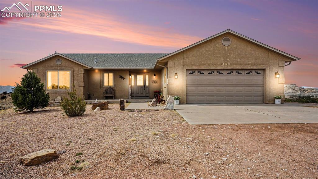 Image 1 of 47: The front yard offers ample space and privacy, blending seamlessly with the