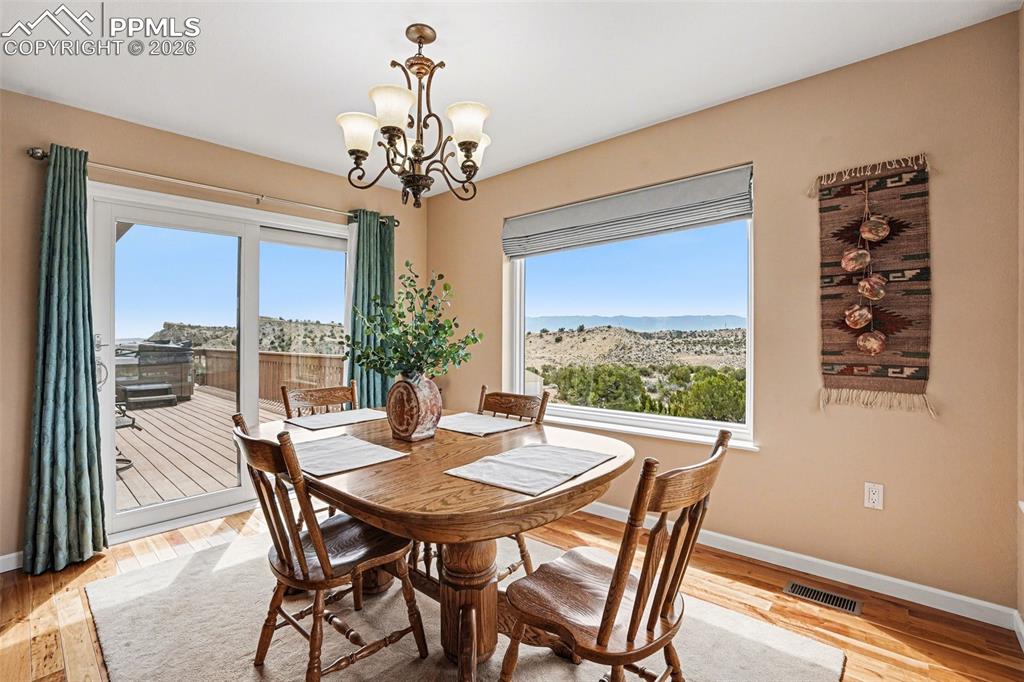 Image 11 of 47: The dining area features an open layout with easy flow from the living room