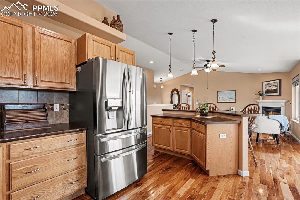 Image 14 of 47: The kitchen features an open-concept layout perfect for entertaining and ev