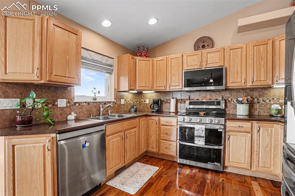 Image 16 of 47: The kitchen features an open-concept layout perfect for entertaining and ev