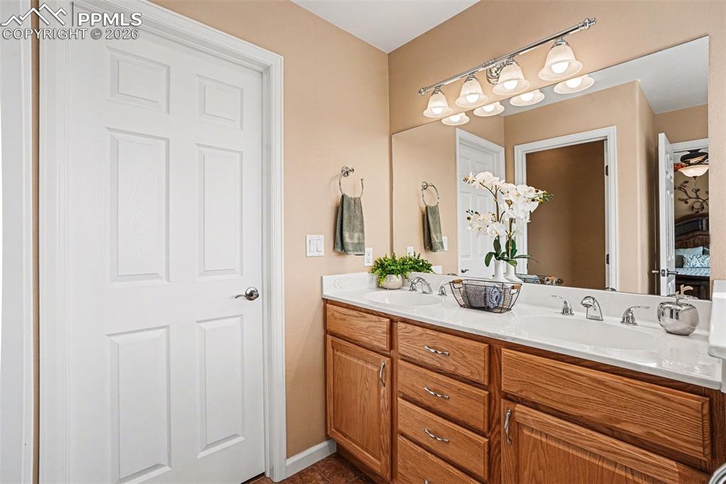 Image 22 of 47: The primary bathroom is luxurious and spacious, featuring a five-piece layo