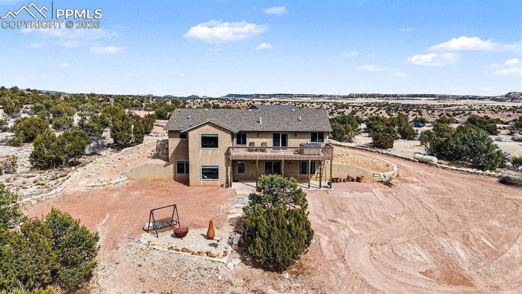 Image 37 of 47: Enjoy breathtaking Colorado sunsets from the Trex deck, hot tub, and back p