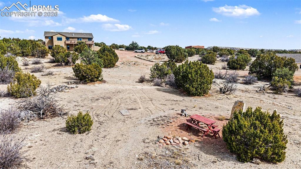 Image 39 of 47: Enjoy breathtaking Colorado sunsets from the Trex deck, hot tub, and back p