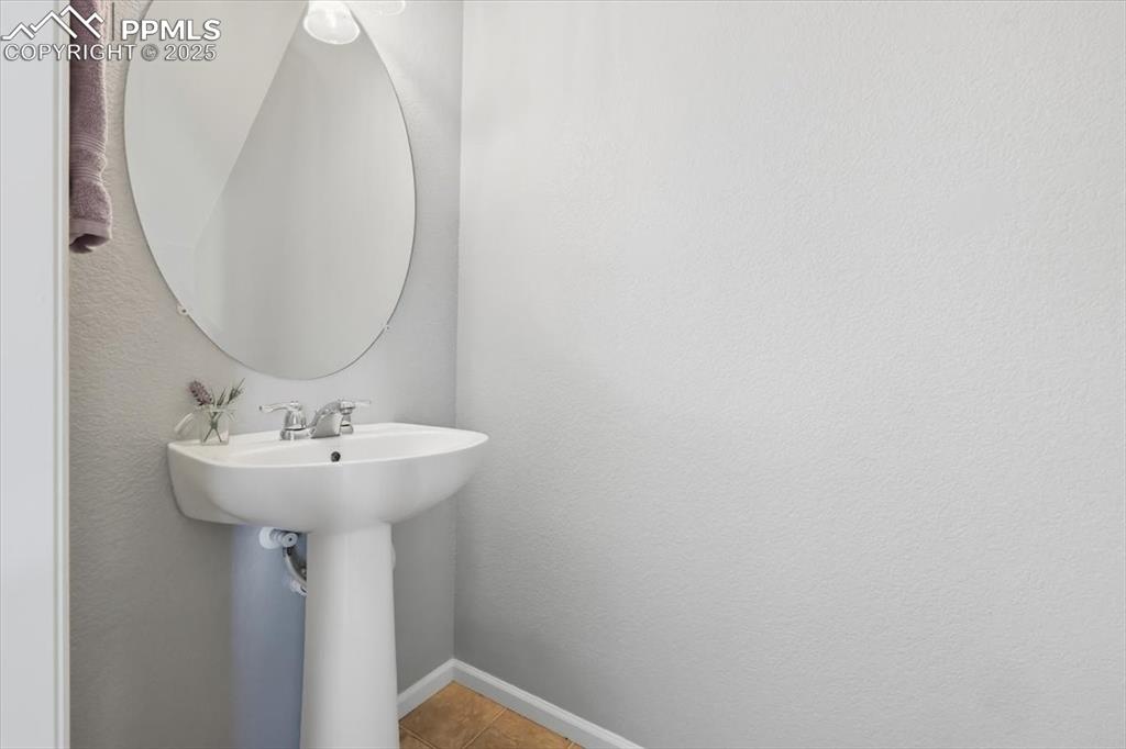 Image 14 of 36: Half bathroom on main level