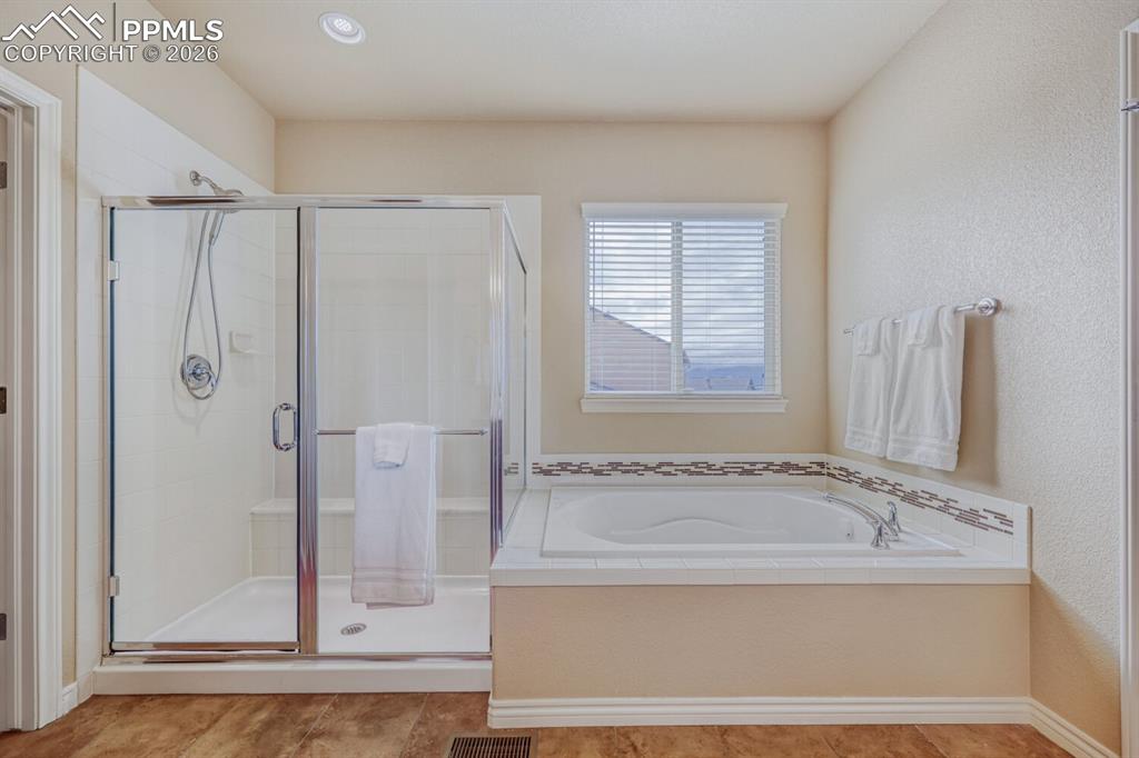 Image 19 of 50: Master Bathroom