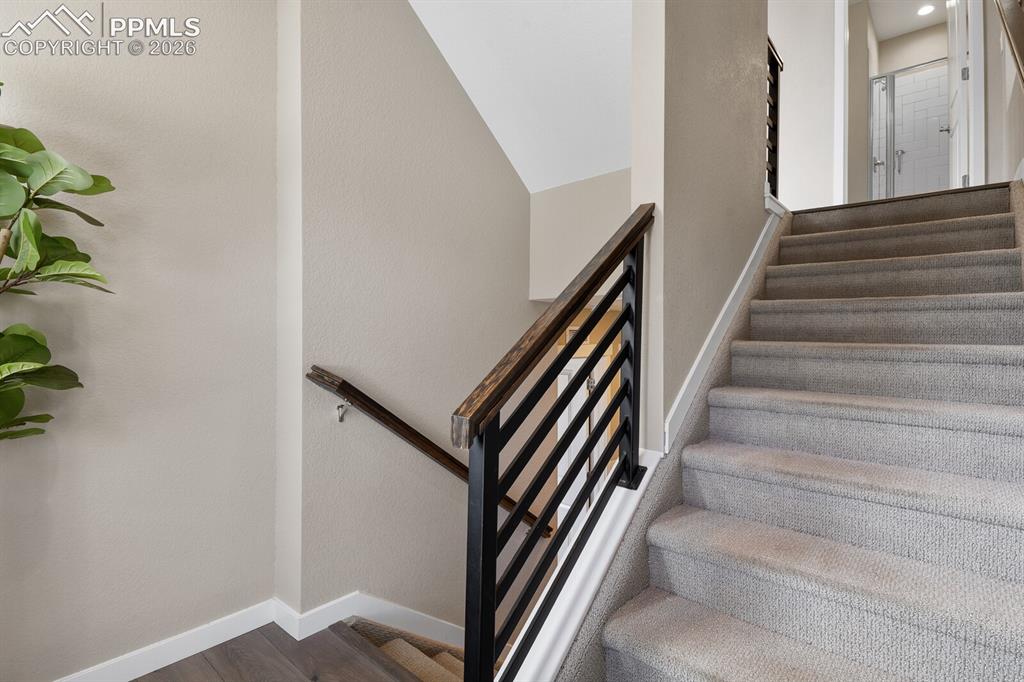Image 16 of 35: Beautiful metal and wood hand rails