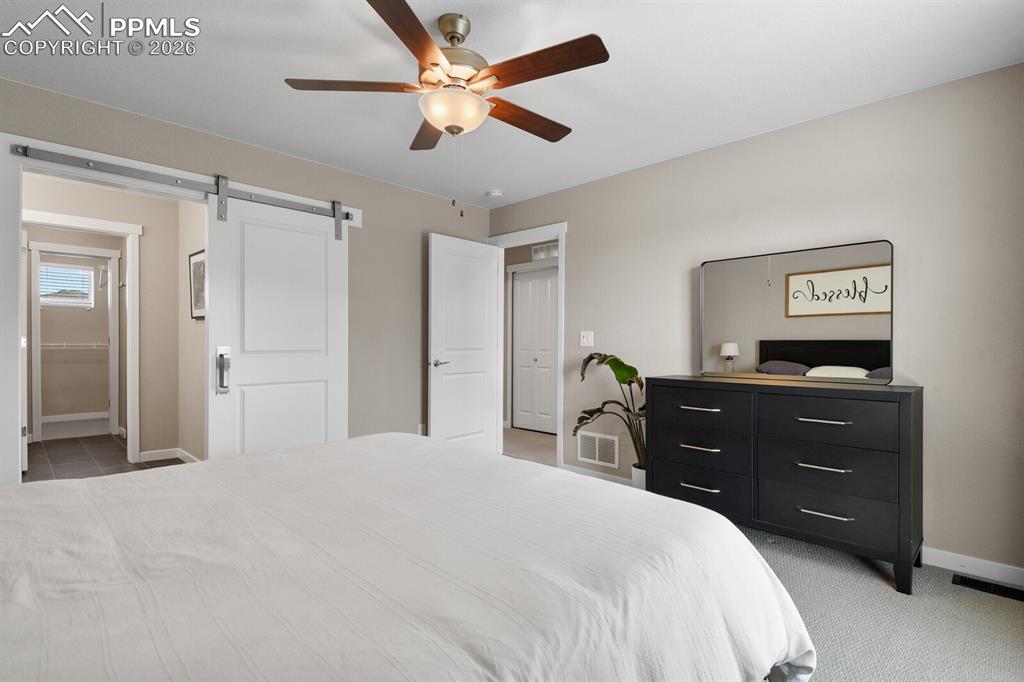 Image 18 of 34: Primary Suite Into Bath & Walk-In Closet