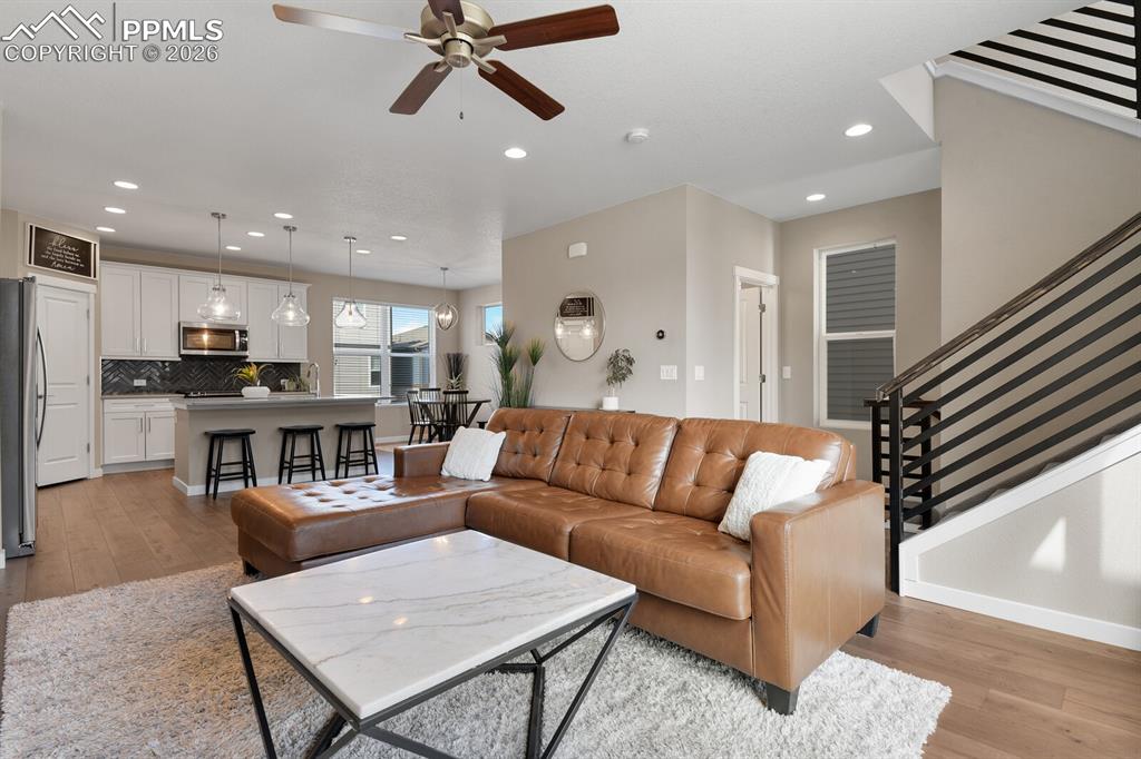 Image 7 of 34: Great Room into Kitchen & Dining 