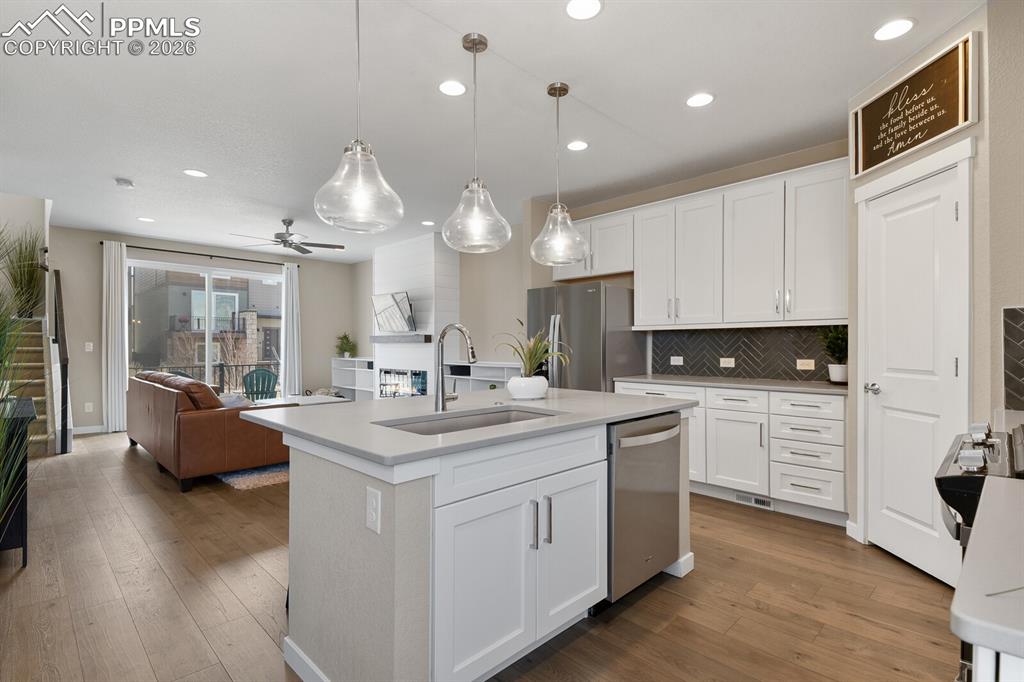 Image 8 of 34: Kitchen into Great Room