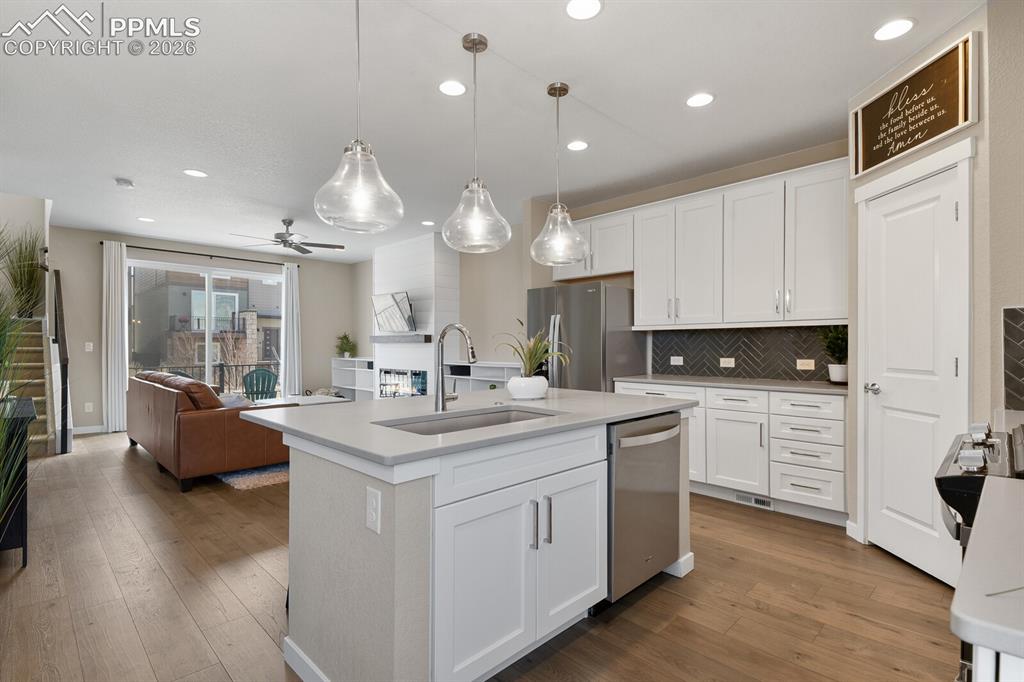 Image 9 of 35: Kitchen into Great Room
