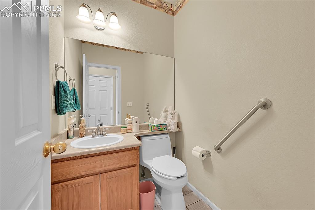 Image 19 of 44: Bathroom featuring vanity and tile patterned floors