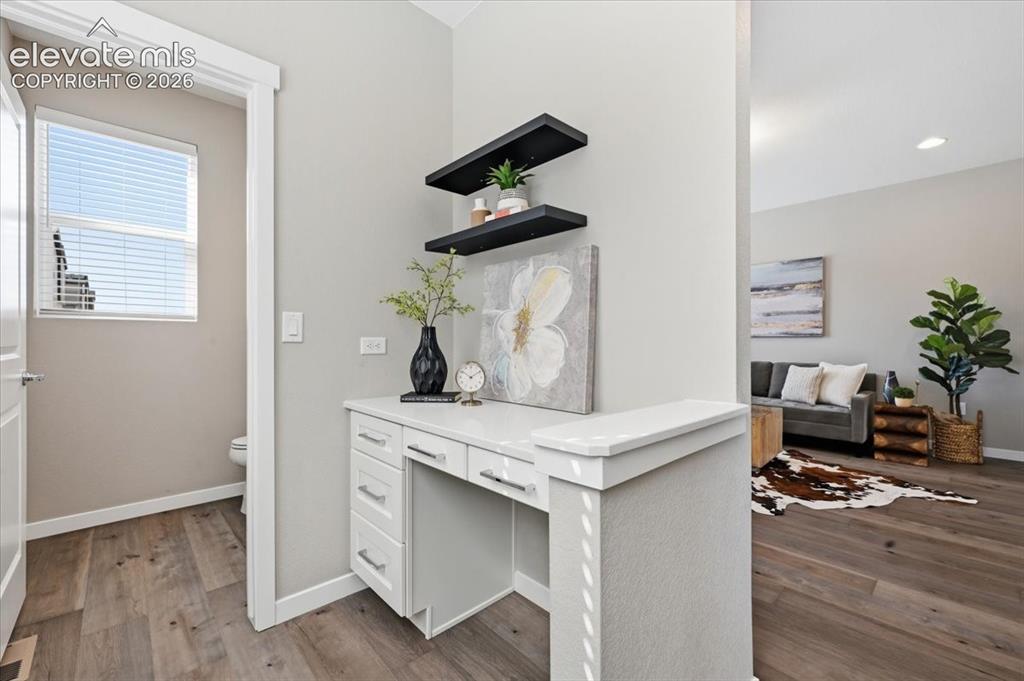 Image 13 of 25: Pocket office off of the family room