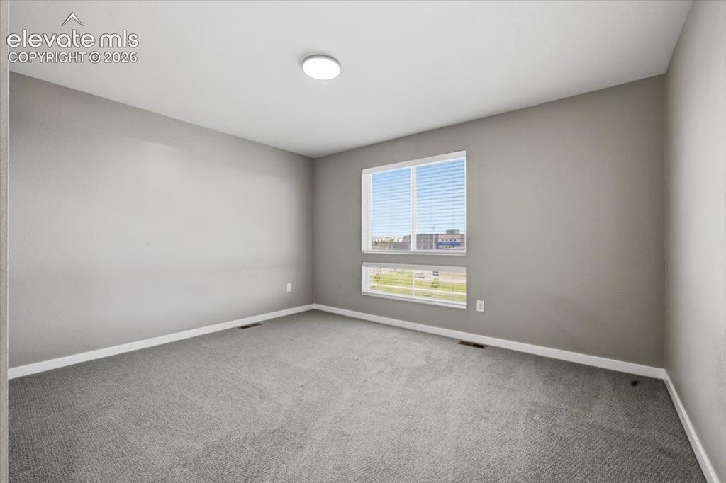 Image 20 of 25: Large secondary upstairs bedroom with en suite bathroom and walk in closet