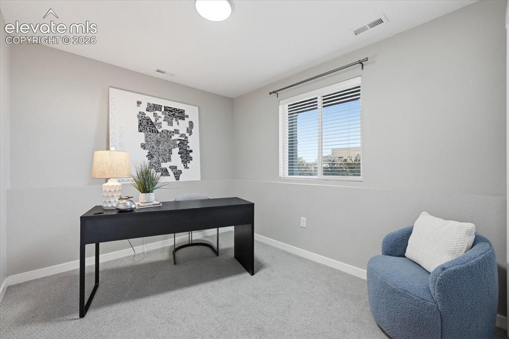 Image 24 of 25: Lower level bedroom with natural light!