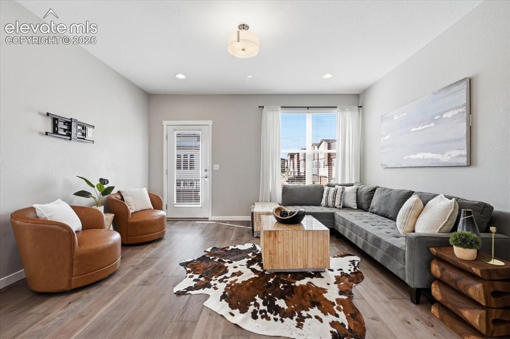 Image 7 of 25: Spacious family room with walk out to one of two decks! 
