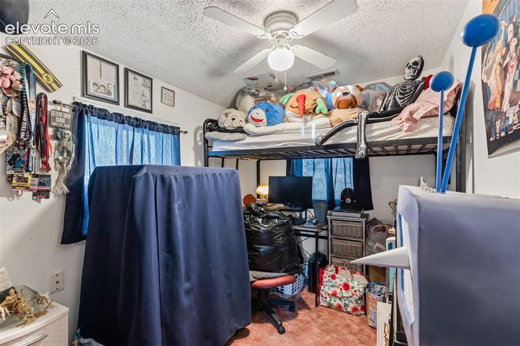 Image 13 of 29: White ceiling fan with integrated lighting