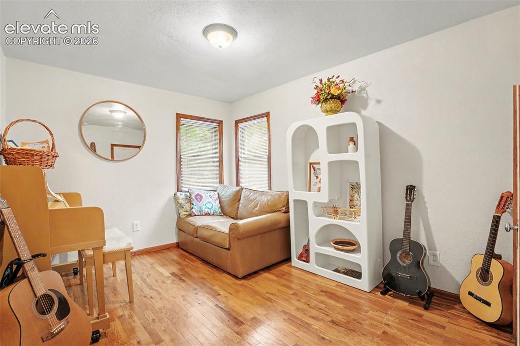 Image 12 of 24: This bedroom is currently used as a music room, but does have its own close