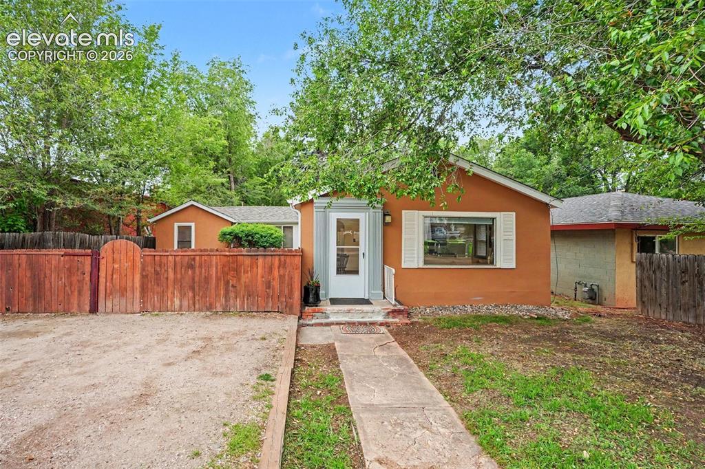 Image 21 of 24: The property also offers three flat off-street parking spaces.