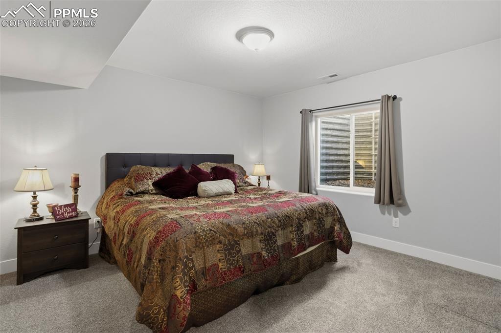 Image 31 of 41: Basement Bedroom