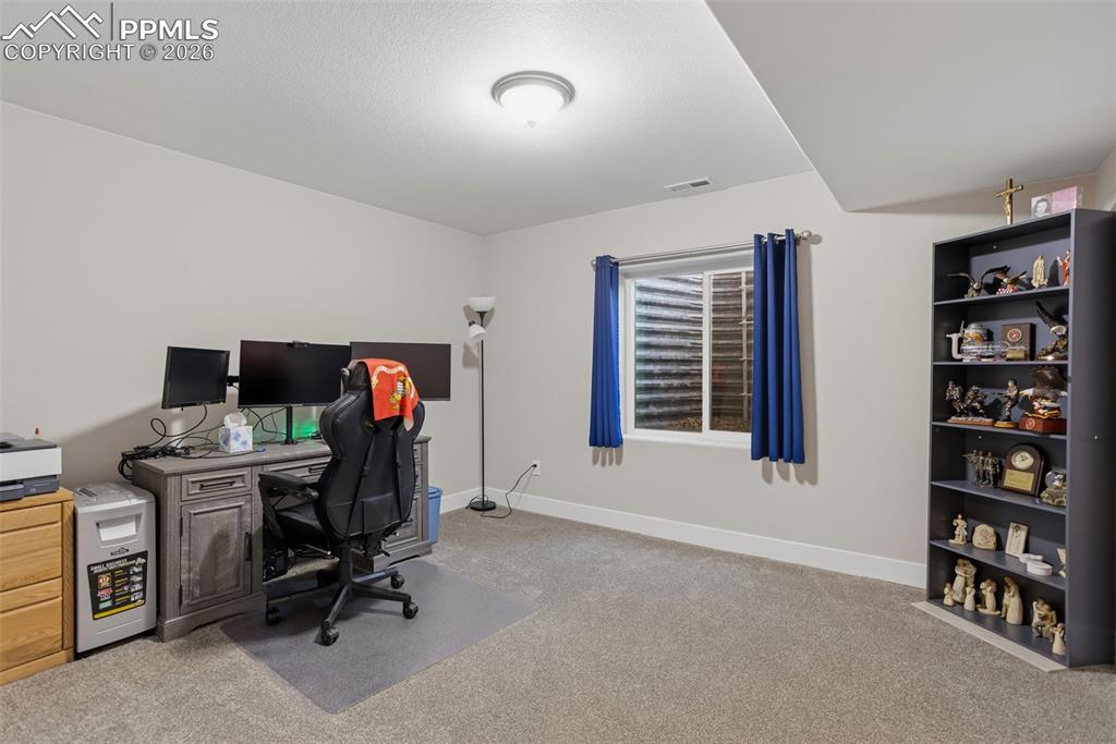 Image 34 of 41: Basement Bedroom