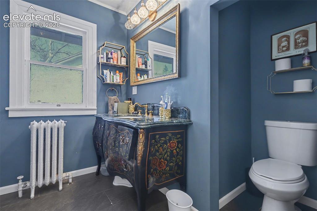Image 23 of 43: Upper level bathroom with clawfoot tub